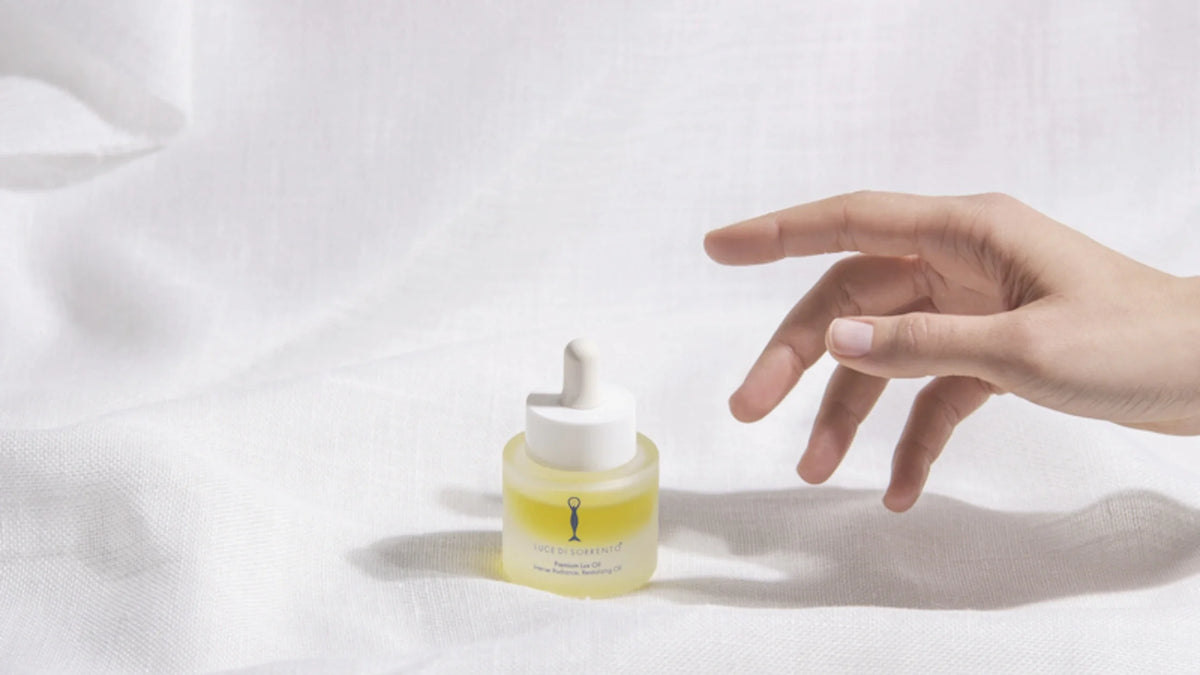 olio di oliva sul viso