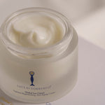 Texture ricca e cremosa della Global Lux Cream nel vasetto aperto